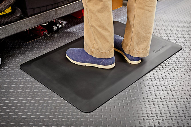 SimplyPerfect™ anti-fatigue mat used in a garage.